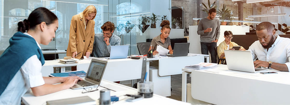 Busy day. Group of multiracial business people working together in the creative co-working space. Team building concept. Office life. Web banner